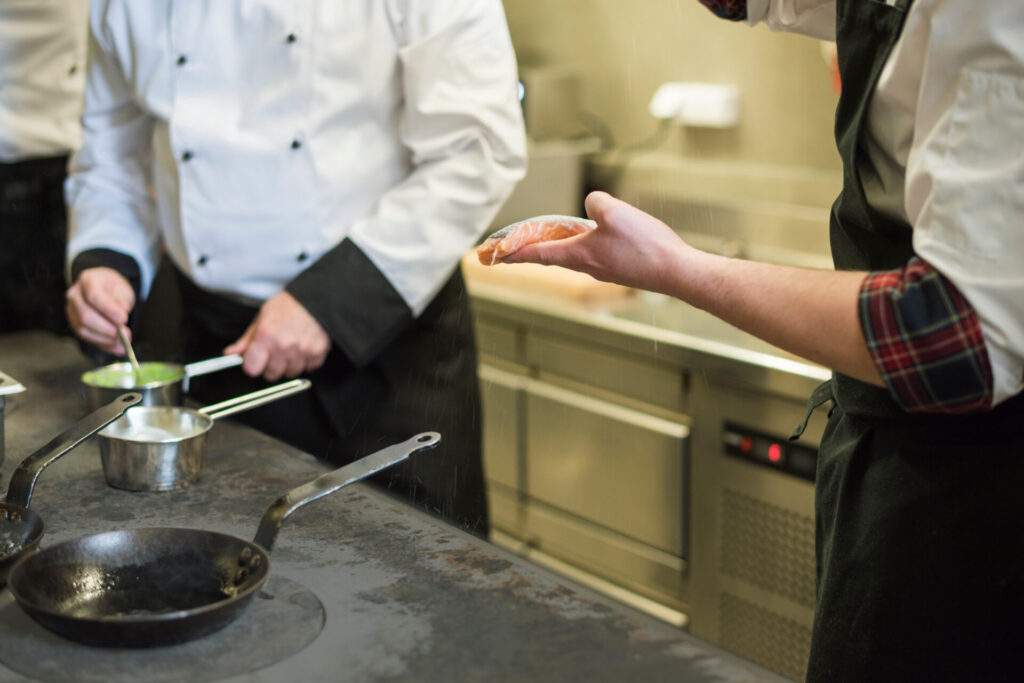 2 chefs discussing, is salmon good for weight loss?