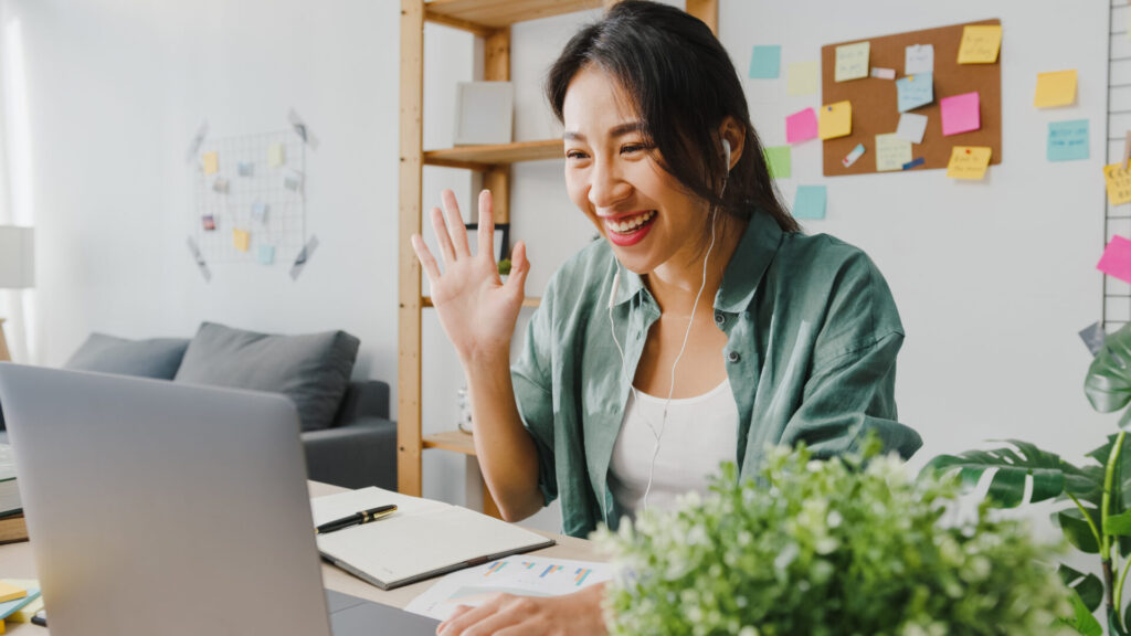 Asian woman on a video call with an online weight loss doctor.