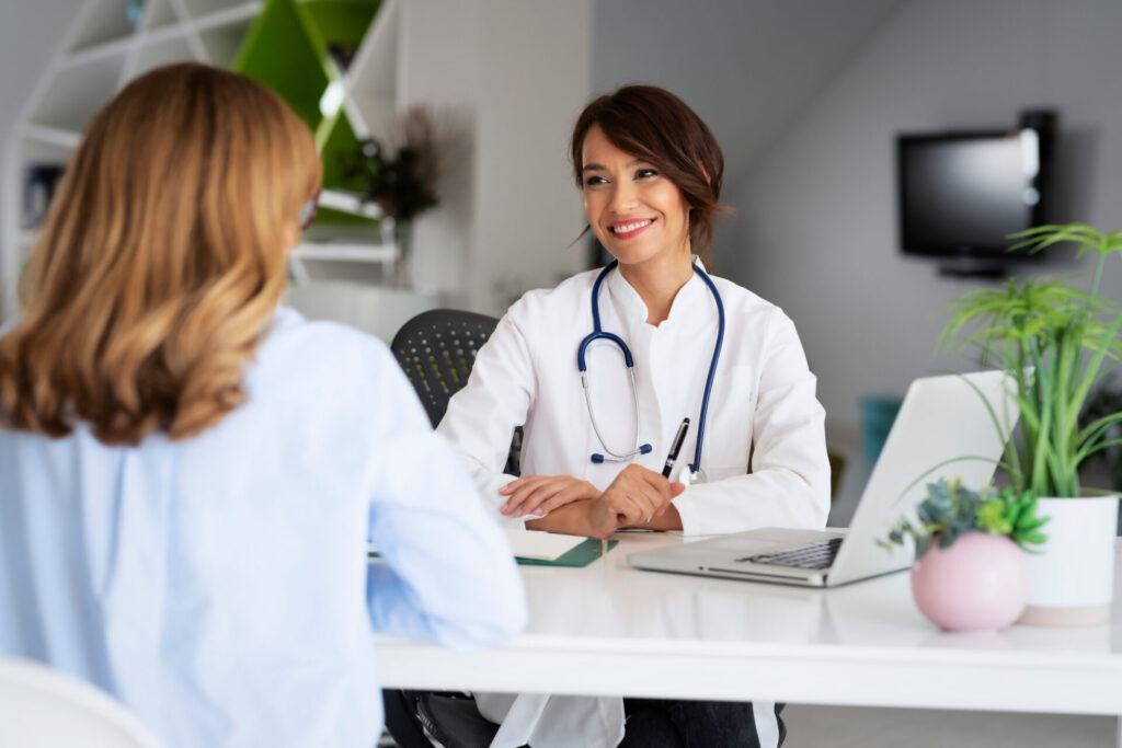 Woman discussing her health with a metabolic specialist.